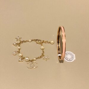 Multi-element charm bracelet and enamel cuff