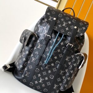 Christopher small shoulder bag with Monogram canvas