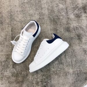 Deep blue Alexander McQueen white leather snakeskin sneakers