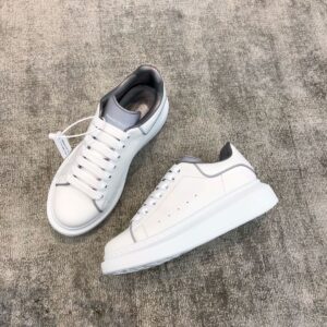 Glow in the dark Alexander McQueen white leather snakeskin sneakers