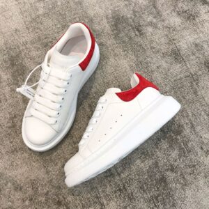 Red tail Alexander McQueen white leather snakeskin sneakers