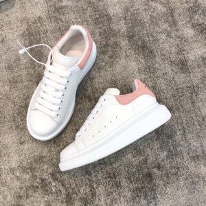 Pink Alexander McQueen white leather snakeskin sneakers