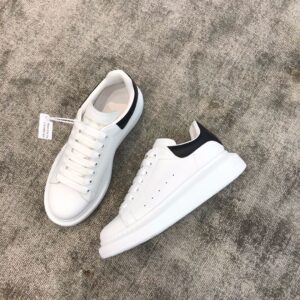 Black leather Alexander McQueen white leather snakeskin sneakers