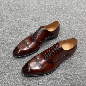 Louis Vuitton carved leather dress shoes