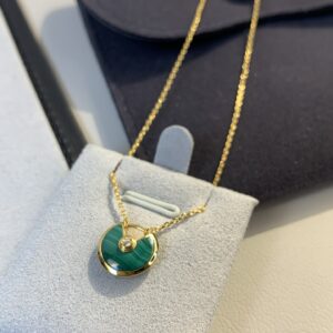 V gold amulet pigeonstone necklace