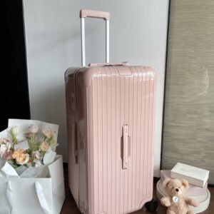 Rose pink rimowa suitcase