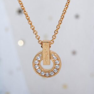 Bvlgari circular coin necklace with hollow design
