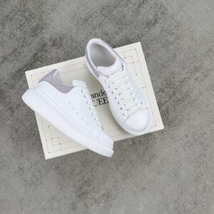 Light gray Alexander McQueen white leather snakeskin sneakers