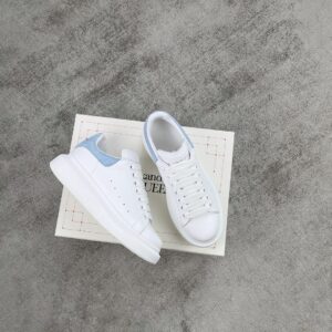 Water blue Alexander McQueen white leather snakeskin sneakers