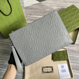 Leather handbag with GG pattern embossing