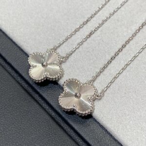 Necklace with C carving marks