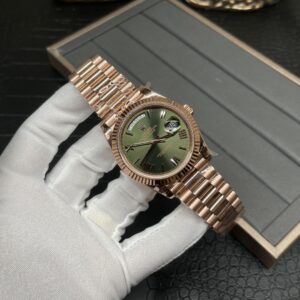 GM Rolex double date rose gold