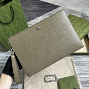 Gray leather handbag with detachable strap