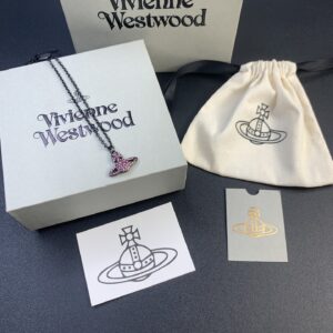 Vivienne Westwood black gold diamond planet earring set