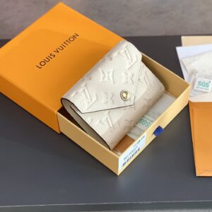 Zoé wallet with Monogram Empreinte leather