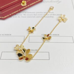 Bvlgari three flower 18k gold diamond arm ring