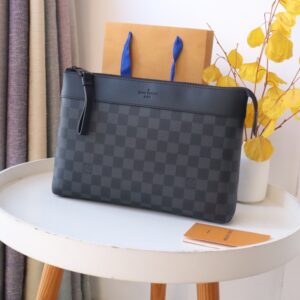 Hermès Pochette Voyage hand bag with dark pattern