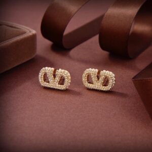 Valentino half pearl half diamond earring