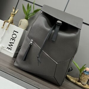 Puzzle backpack with small front pocket