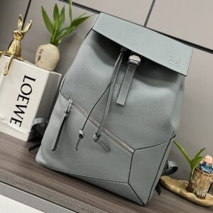 Puzzle backpack with small front pocket
