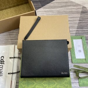 Gucci logo embossed leather handbag