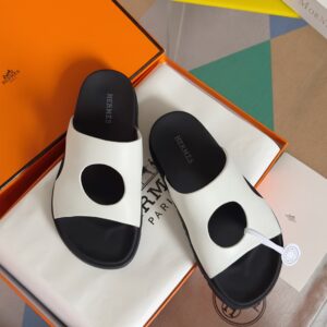 Hermes round hole loafers