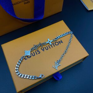 Louis Vuitton handchain with LV letters Monogram hook, fine polished metal chain, creative clasp detail