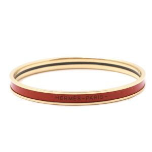 Narrow enamel bracelet with gold rim and red color numbered 0001553211