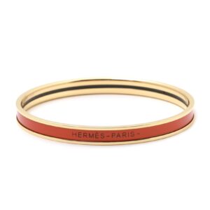 Narrow enamel bracelet with gold rim and orange color numbered 0001553211