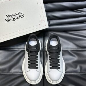 Alexander McQueen couple thick sole elevating shoes