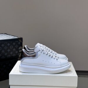 Alexander McQueen couple thick sole elevating shoes