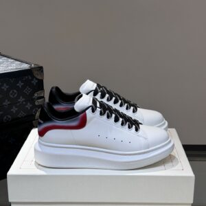 Alexander McQueen couple thick sole elevating shoes