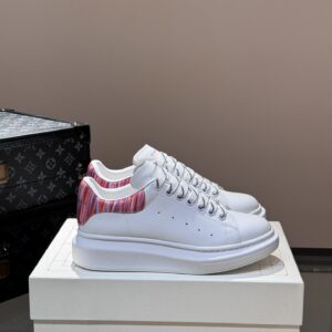 Alexander McQueen couple thick sole elevating shoes