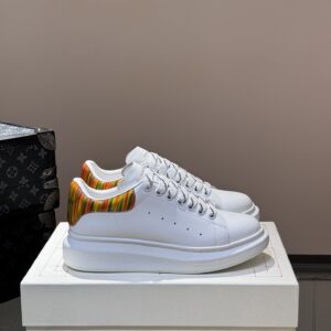 Alexander McQueen couple thick sole elevating shoes