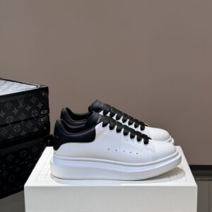 Alexander McQueen couple thick sole elevating shoes