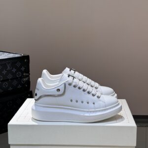 Alexander McQueen couple thick sole elevating shoes