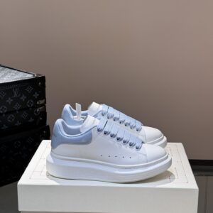 Alexander McQueen couple thick sole elevating shoes