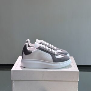 Alexander McQueen couple thick sole elevating shoes