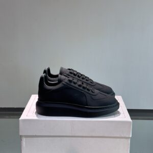Alexander McQueen couple thick sole elevating shoes