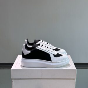 Alexander McQueen couple thick sole elevating shoes