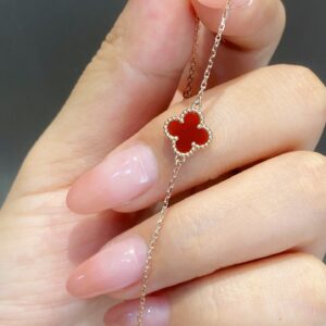 VCA small red flower arm ring