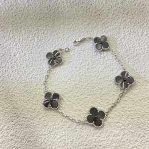 VCA laser-engraved black and white four-leaf bracelet