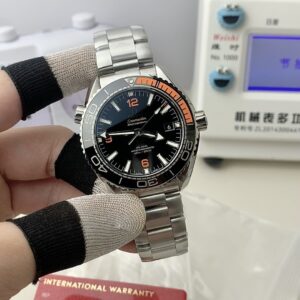 VS Omega Aqua Terra 600 quarter orange watch