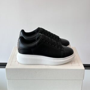 Alexander McQueen couple thick sole elevating shoes
