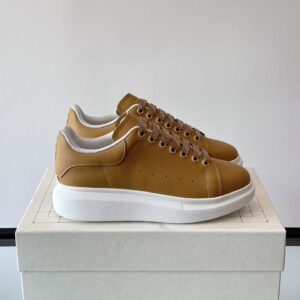 Alexander McQueen couple thick sole elevating shoes