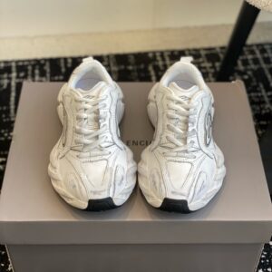 Sneaker with track and runner inspired design