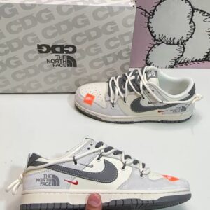 Nike Dunk Low SB sneakers with orange accents