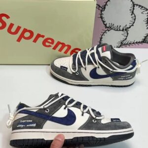 Nike Dunk Low SB sneakers with letter pattern