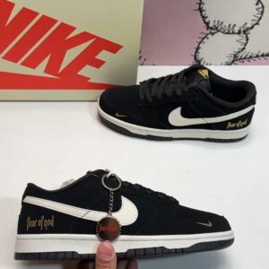 Nike Dunk Low SB sneakers with golden logo
