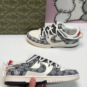 Nike Dunk Low SB sneakers with Gucci pattern